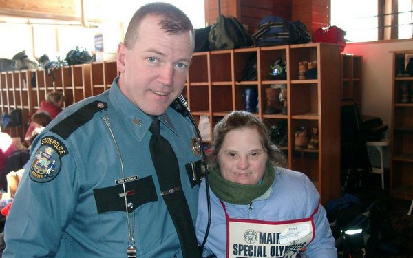 Maine Trooper Sgt. Matt Casavant with Maine Special Olympics Winter Games contestant 2010.